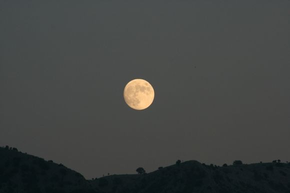 Full moon over the hills behind Acharavi
