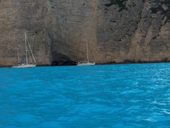 boats side by side to rocks of \'navagio\'