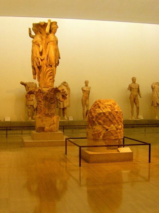 Omphalos (Earth\'s center) and the Dancers