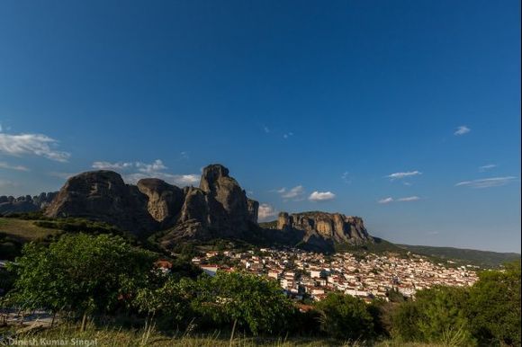 Kalambaka town nestled at the foot of Meteora cliffs.