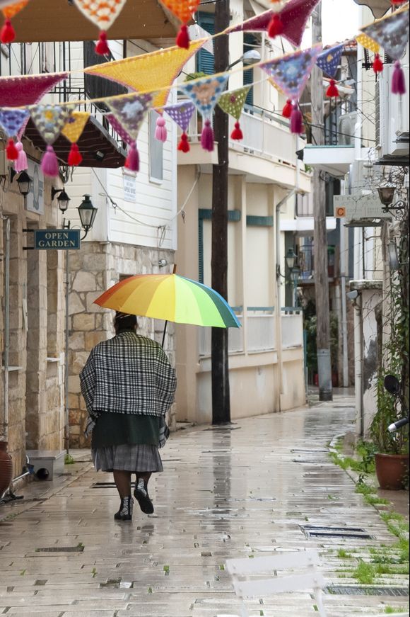 Rainy Christmas colors of old Lefkada town.
We are back to Greece after two years. And both of us, me and my wife, have the same somewhat strange feeling we are getting used to. When we are back to Ukraine it is always like what was there before Greece is another life in a distant past. It is opposite here. We feel like we never left and there were no those two exhausting years...