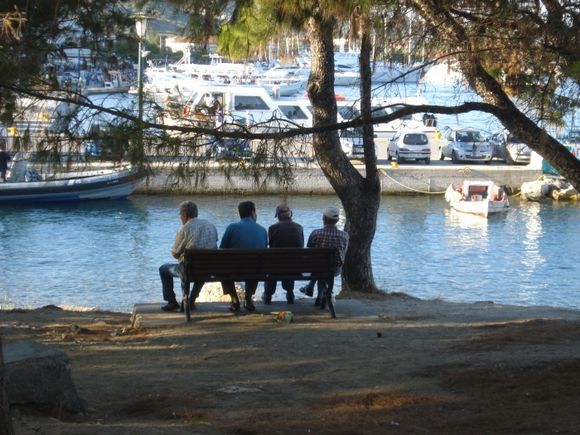 Skiathos. Men having their afternoon coffee at the port