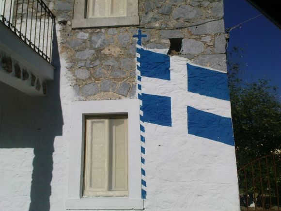 greek flag painted on house