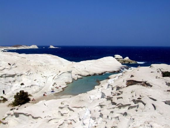 the famous combination of bright white and dark blue at Sarakiniko beach, to Milos island