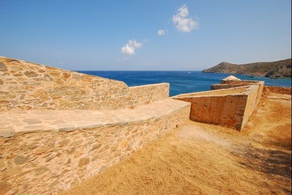 The island of Spinalonga, also known as Kalydon, is located in East Crete off the coast of mainland Crete close to the villages of Elounda and Plaka in the Lasithi region.