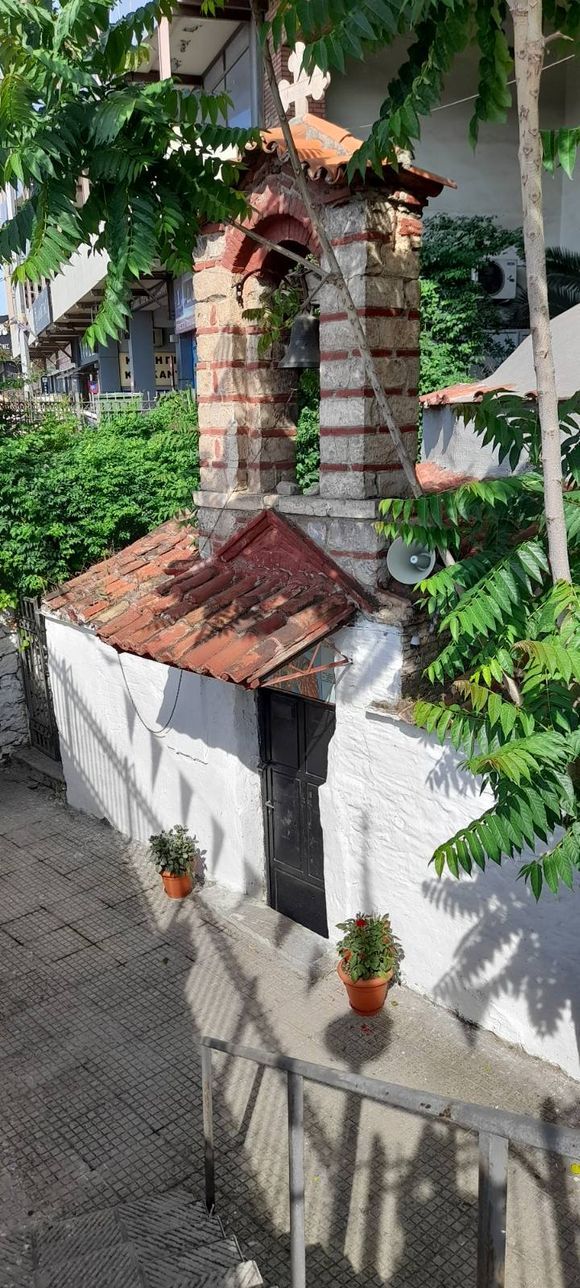 A small church at the entrance of the bus terminal in Athens.