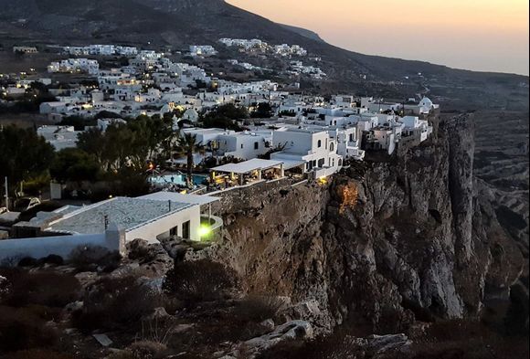 Chora white houses at sunset time