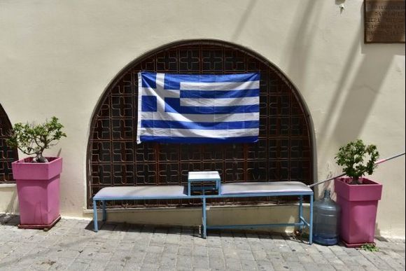 take  a seat in Greece