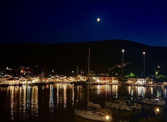 Crescent moon over Fiskardo Port. 