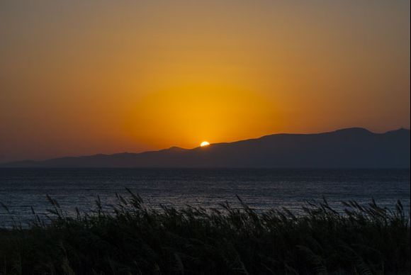 Sunset behind Paros
