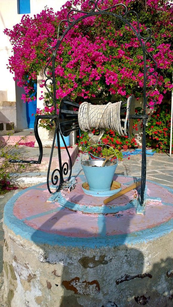 Water well in the traditional village of Plaka in Milos