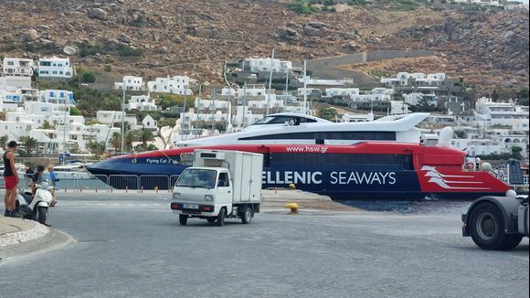 A busy place and contrast of vehicles at the new Mykonos port