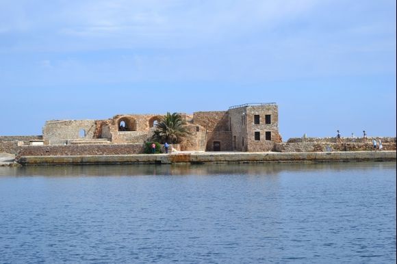 Harbour wall and old building