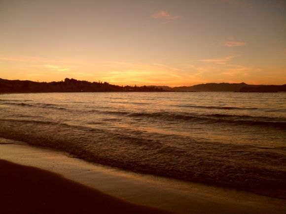 Sunset at Agii Apostoli Beach