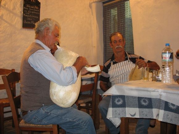 restaurant owner and 
his friend playing bagpipes