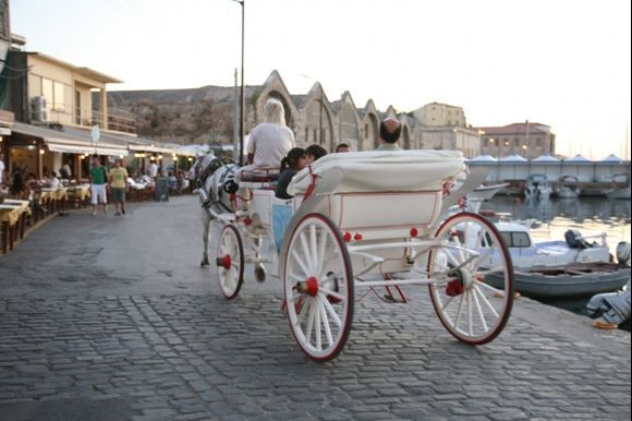 A carriage passing a street of Crete