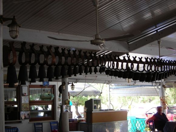 Largest collection of goat bells hanging from the ceiling
