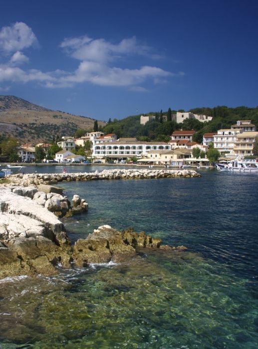 a view of Kassiopi harbour from the rocks