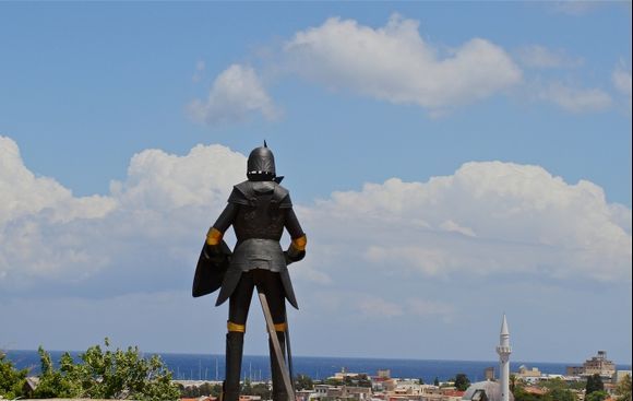 Knight looking out from the Roloi- The Clocktower of Rhodes