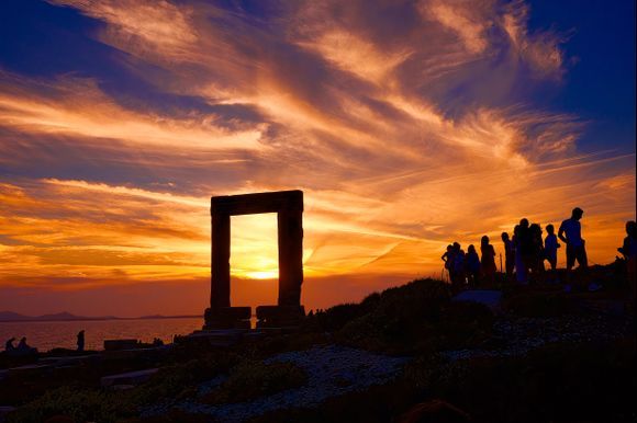sunset on theThe Portara, an unfinished Temple dedicated to Apollo