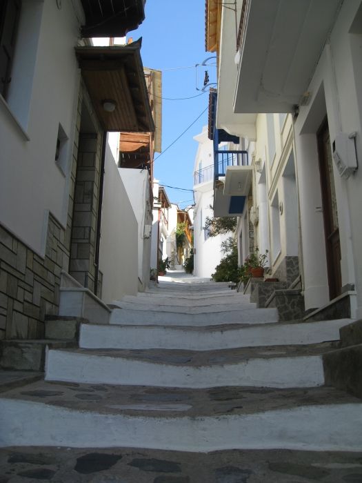The same set of stairs as in one of the other pictures, but now the whole street is in the shade, and the women will often sit outside on the steps and natter.