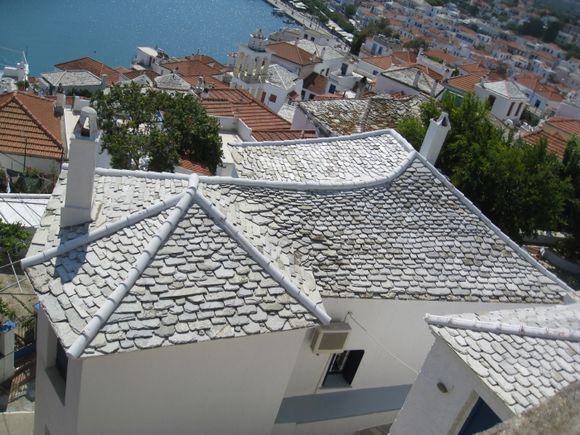 A beautiful traditional stone roof seen from above.  Note how the size of the stones is graded  so that the smallest are at the top of the roof.  the same thing is seen in England and Wales.