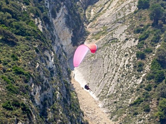 Paragliders above Myrtos Beach