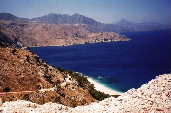 View of the dark blue sea and the  dramatic rough  coastline of Karpathos.