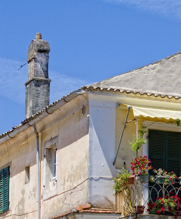 One terrace, one chimney and a seagull in the distance