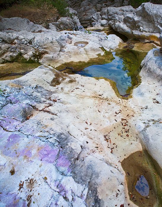Colorful rocks near Nidri waterfall