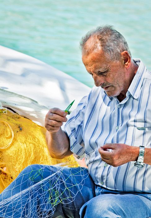Fisherman at Vassiliki port