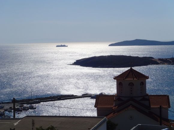 Andros, Batsi, little ferry on big sea