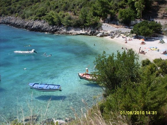 Fantastic boat shade on charming beach of Evgiros