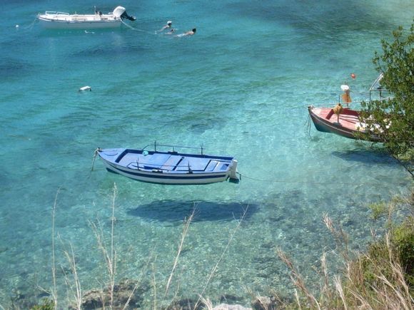 Fantastic boat shade on charming beach of Evgiros