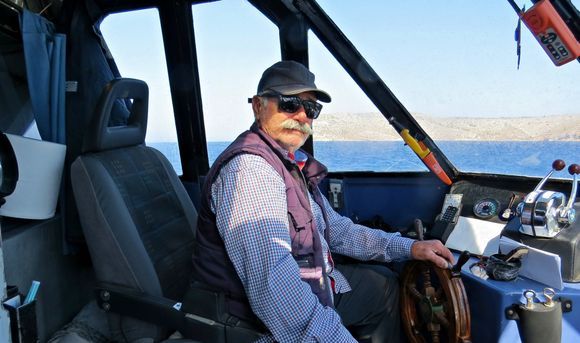 18-09-2018 Patmos: At sea, the skipper who braught us with a small boat from Patmos to the very small Island Marathi