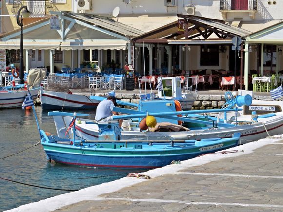 09-09-2019 Samos: Pythagorio ....Fisherman busy on this small boat