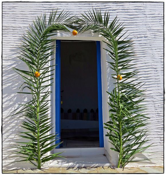 06-09-2022 Tinos: A festive entrance of a small church