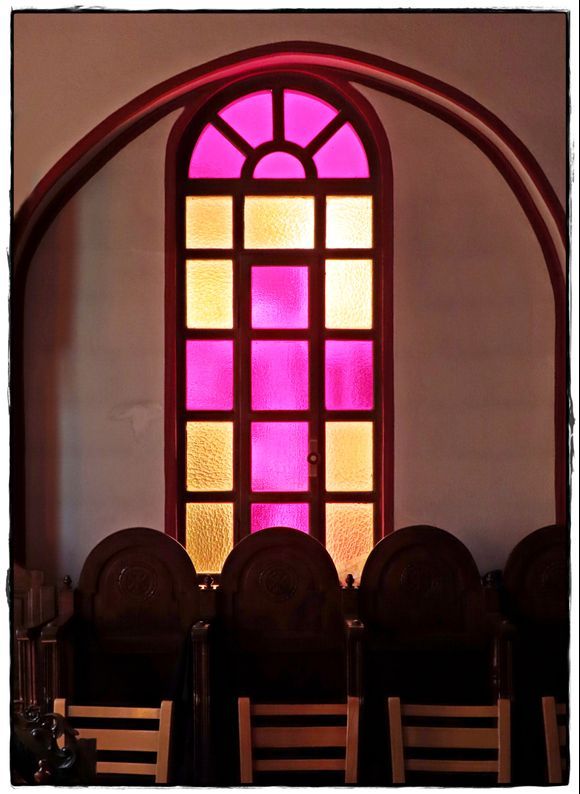 18-09-2023 Crete: Light through the window of a chapel at Monastery Panagia Kaliviani near the town of Mires