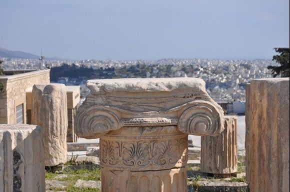 Ancient cities in foreground with a modern city backdrop