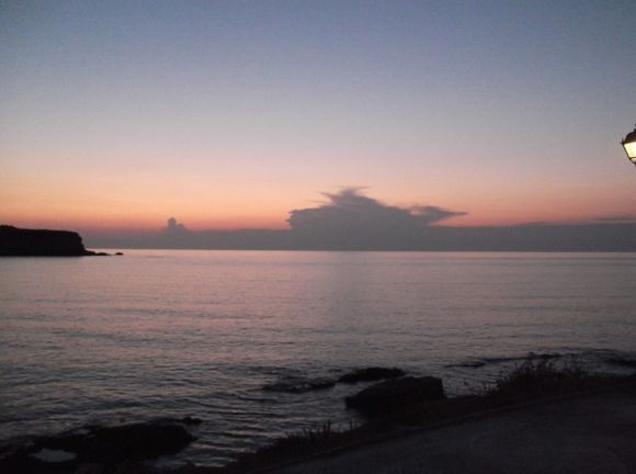 At Sifneiko beach Antiparos. Cloud shaped as a ferry during sunset!