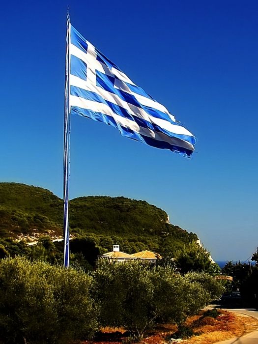 Keri cape 2 - The biggest Greek flag.
Guiness world records: 18,1 x 36,9 = 667,89 m2.
In the background is Keri lighthouse.