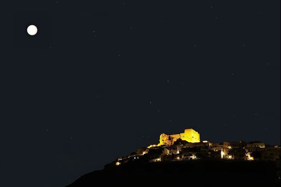 Night view of Castle of Querini from Pera Gialos