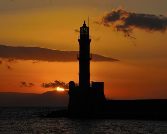 The Venetian lighthouse of Chania at sunset.