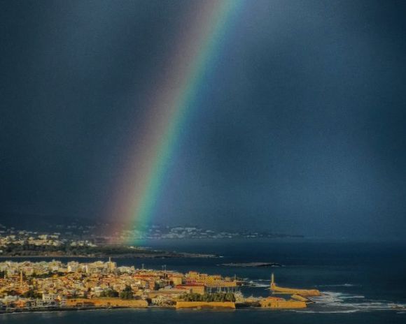 A rainbow over Chania's Old Town and harbor area.