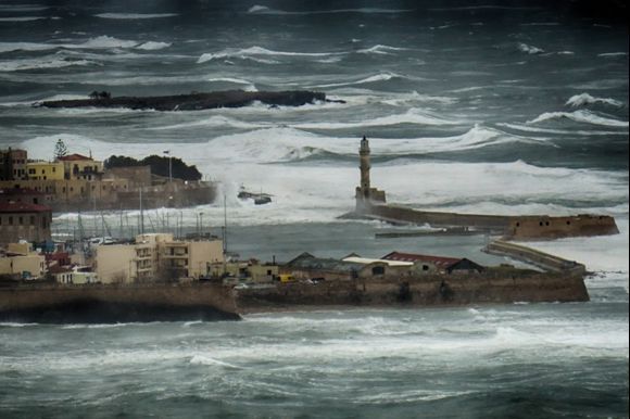 A Winter storm surrounds Chania's harbor.
