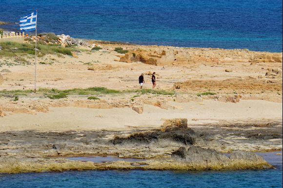Visitors in the Stavros Beach area by the sea.