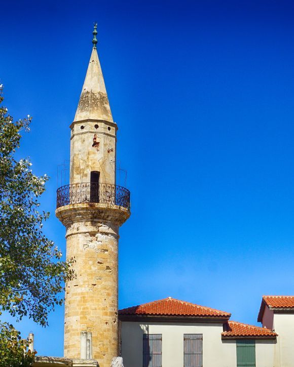 The minaret of Ahmet Aga towers above neighborhood houses on Hatzi Michali Daliani street behind the Agora and serves as a reminder of Chania's architectural and cultural history.
