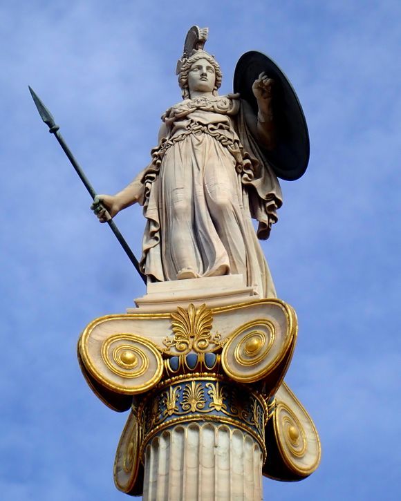 Statue of Athena outside of the Academy of Athens. Athena is Athens' patron deity and the goddess of wisdom, warfare, and the crafts.