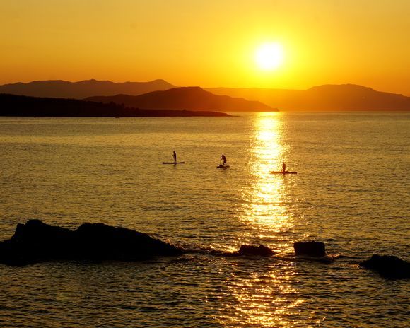 Paddling into the first sunset of summer.