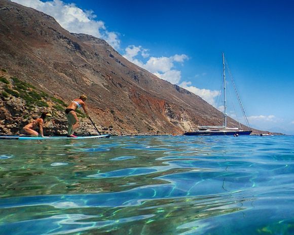 Standup Paddleboard and Luxury Sailing Yacht in Loutro